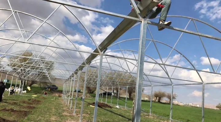 Step-by-step greenhouse installation process illustration